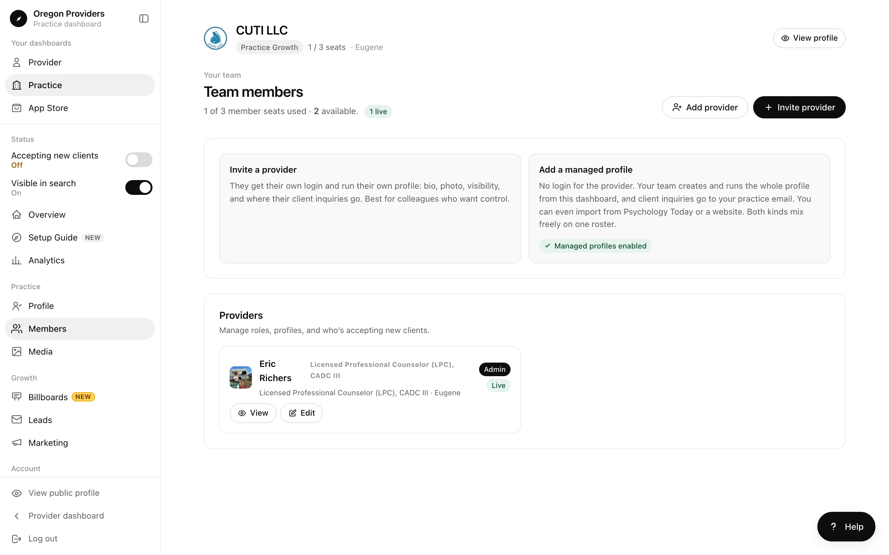 Team members screen explaining invited providers and managed profiles, above the provider roster